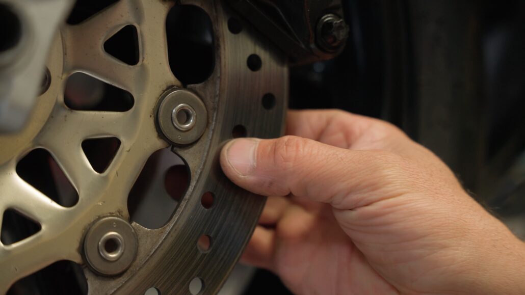 checking motorcycle brake fluid and discs
