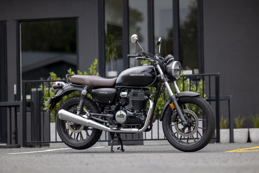 Great photo of a Honda GB350 parked outside a cafe