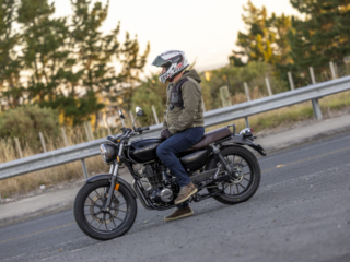 Honda GB350 parked next to a road, IXON jacket and Shoei Air-3 helmet