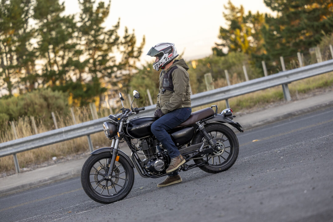 Honda GB350 parked next to a road, IXON jacket and Shoei Air-3 helmet