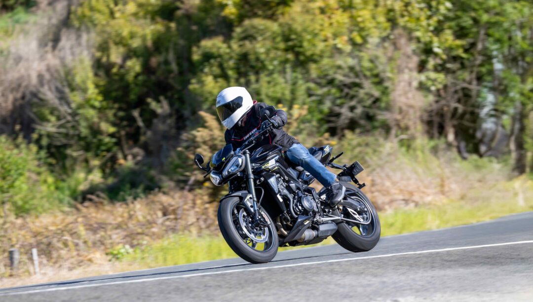 Triumph Street Triple 765RS cornering action shot on New Zealand road