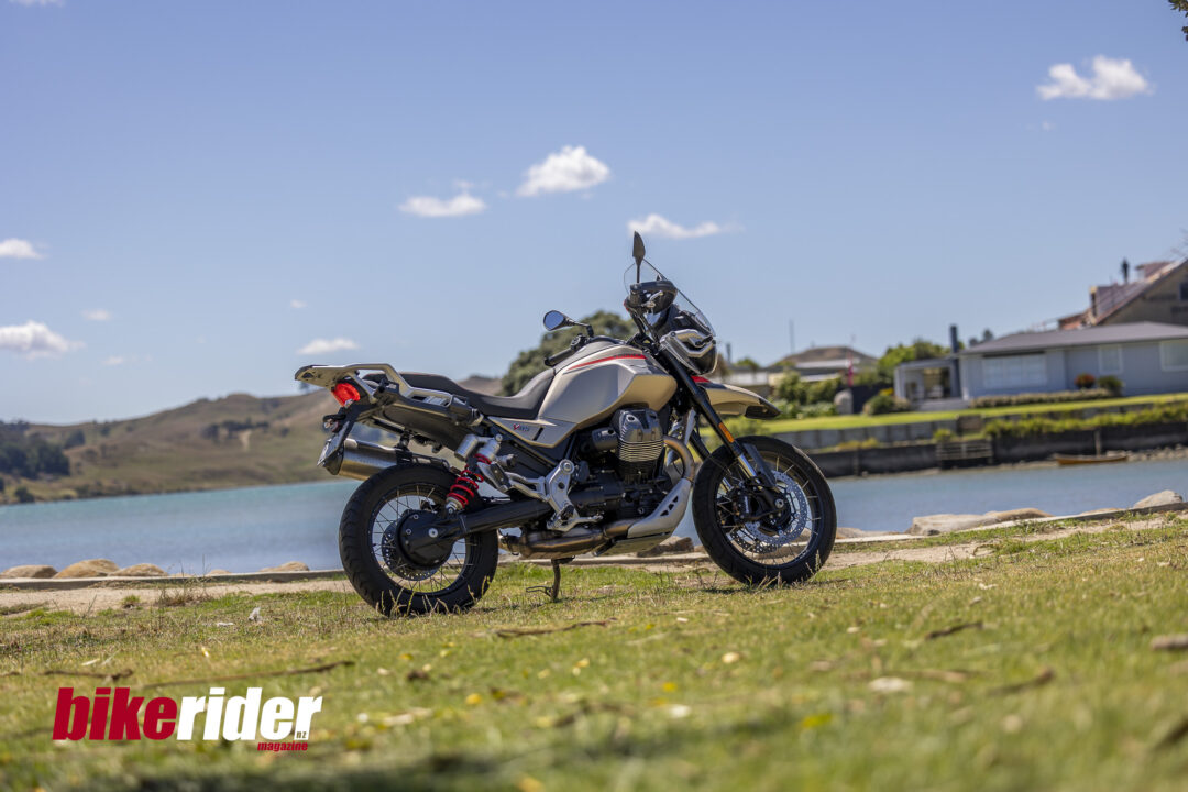 Moto Guzzi V85TT Travel parked by the water BRM NZ