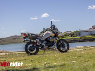 Moto Guzzi V85TT Travel parked by the water BRM NZ