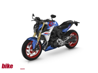 2025 BMW F900R naked roadster in Sport paint scheme with red wheels and bold graphics.