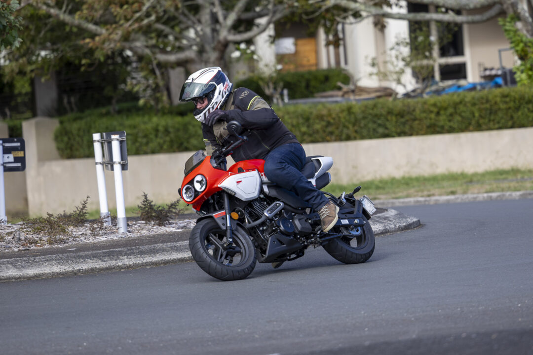 CFMoto XO Papio review cornering action shot around roundabout