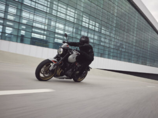 2026 Trident_800 action white on a road