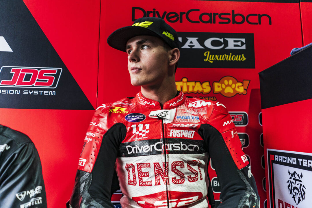 “Cormac Buchanan in the pit garage of his Denssi BOE Motorsports Moto3 team during the Malaysian Grand Prix at Sepang International Circuit. The Southland rider is wearing his blue and red race leathers under the blazing tropical heat.