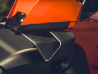 KTM 990 RC R side profile showing MotoGP-inspired fairing and winglets up close