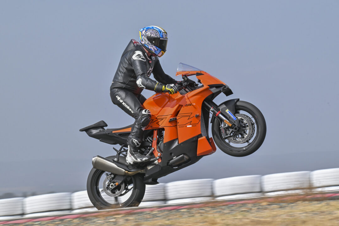 KTM 990 RC R on track at Seville Circuit, wheel stand while standing up on the pegs