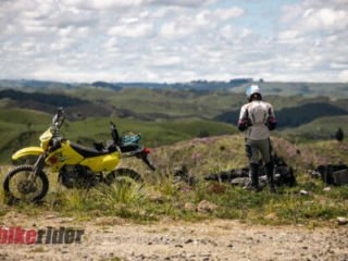 Female BMW GS Rallye riders tackling gravel roads in the Rangitikei region looking at the incredible scenery