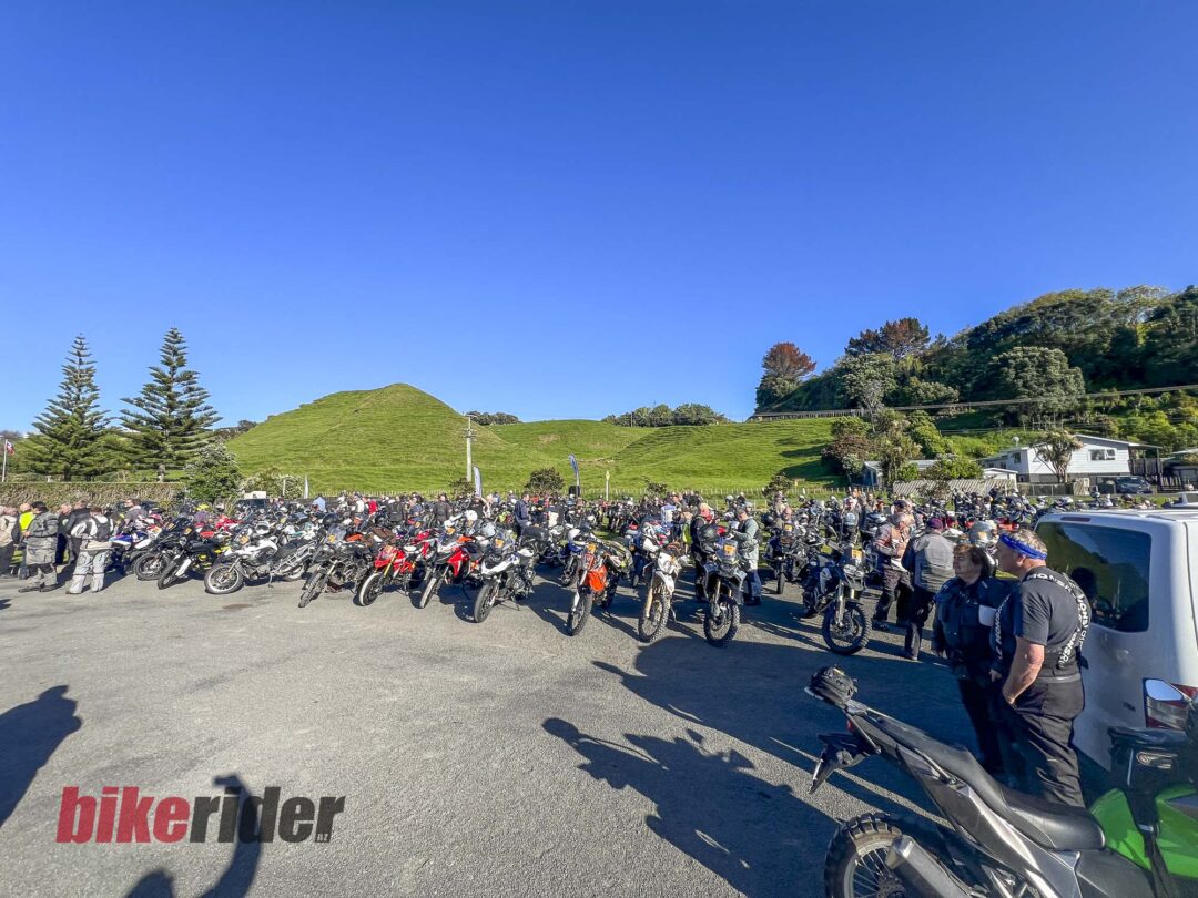Mixed adventure motorcycles parked at Kai Iwi Beach Holiday Park during BMW GS Rallye