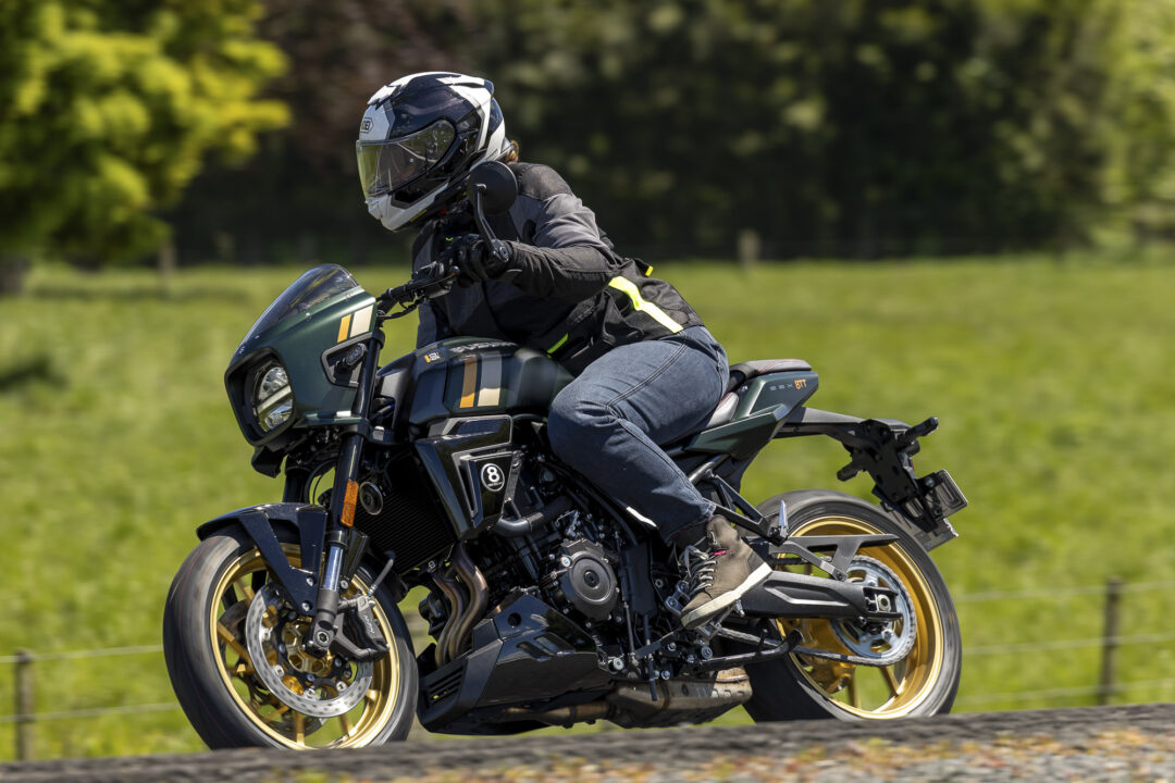 Suzuki GSX-8TT action road female rider