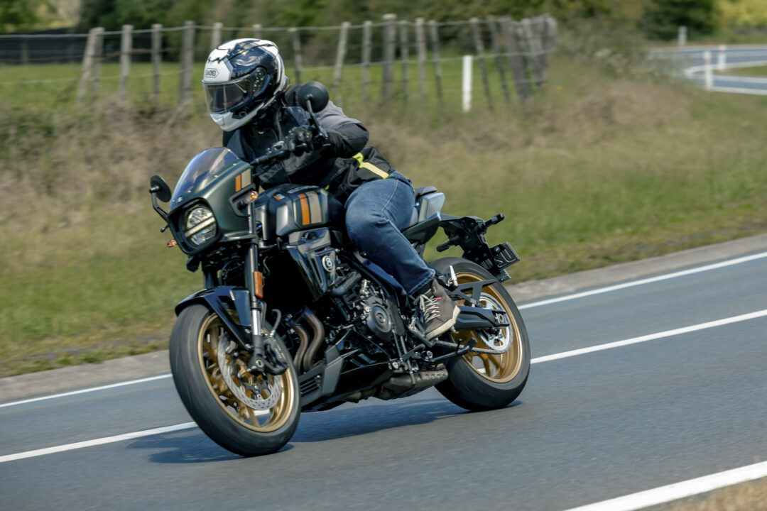 Suzuki GSX-8TT action road female rider