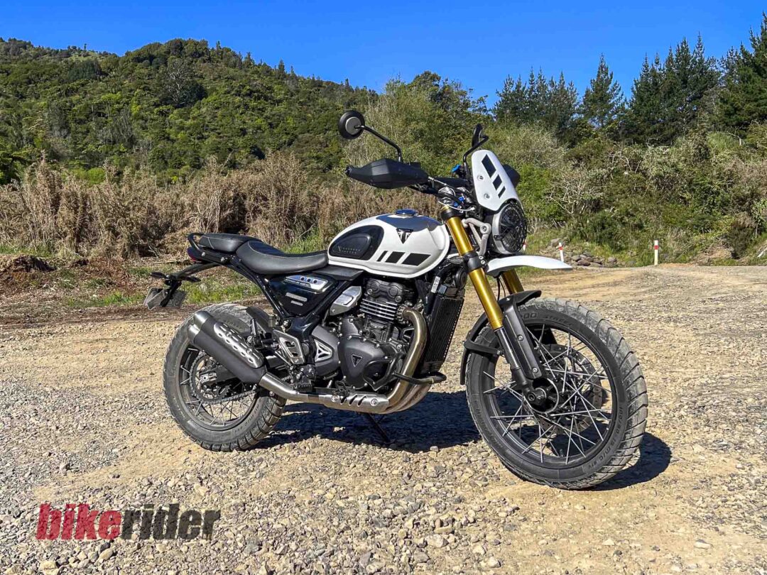 Triumph Scrambler 400XC showing spoked wheels, high front mudguard and gold forks