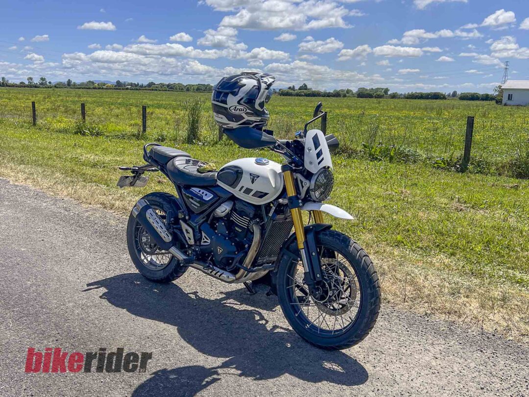 Triumph Scrambler 400XC parked on winding road