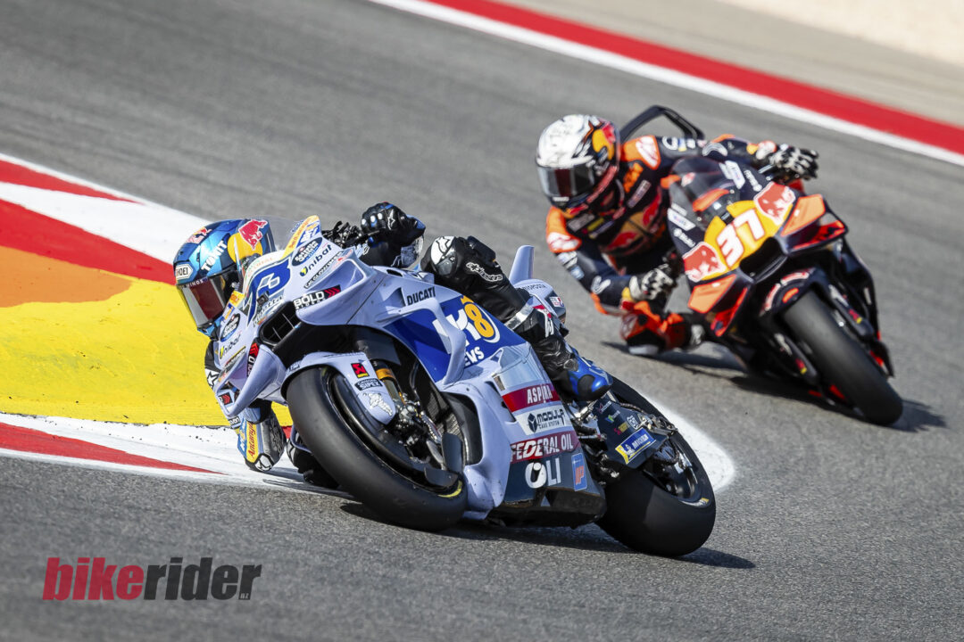 MotoGP Rd21 Autodromo International Algarve Alex Marquez action followed by a KTM