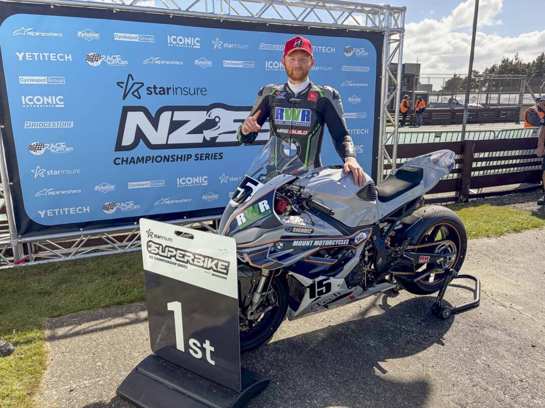 Rogan Chandler on the podium with the RWR BMW S1000RR