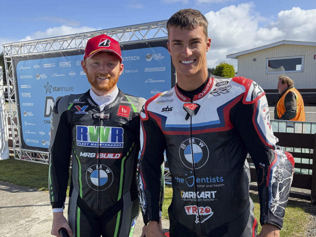 NZSBK Rogan Chandler and Luca Durninng stand together at the NZSBK