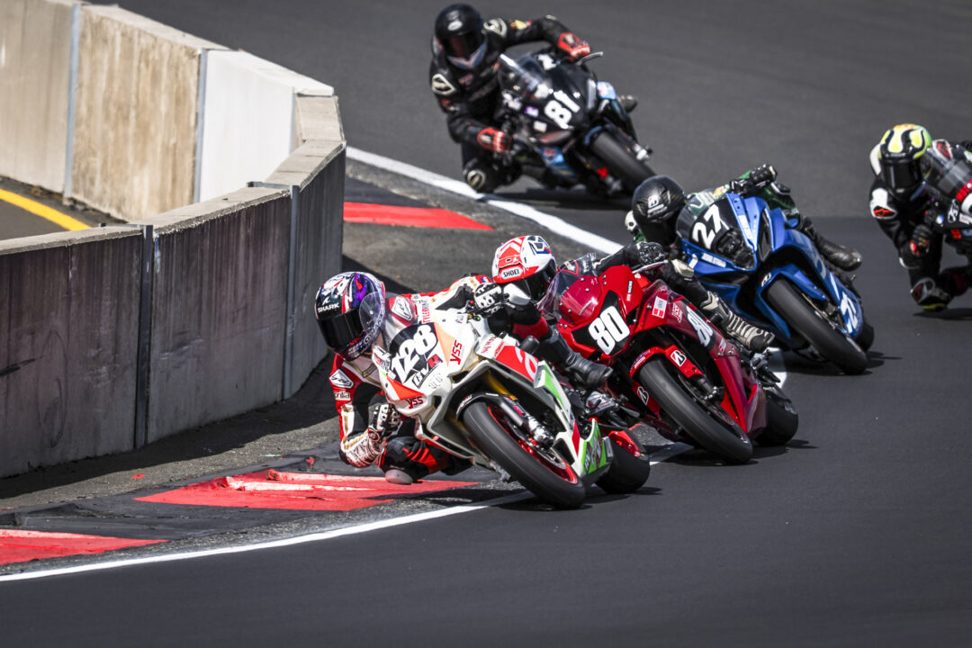 Tyler King leads Zak Fuller and others in teh Sportbike class at Hampton Downs