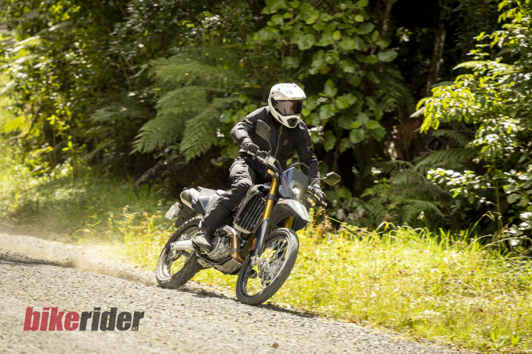 Rider wearing new Leat Gear testing the Suzuki DR-Z4S on the gravel