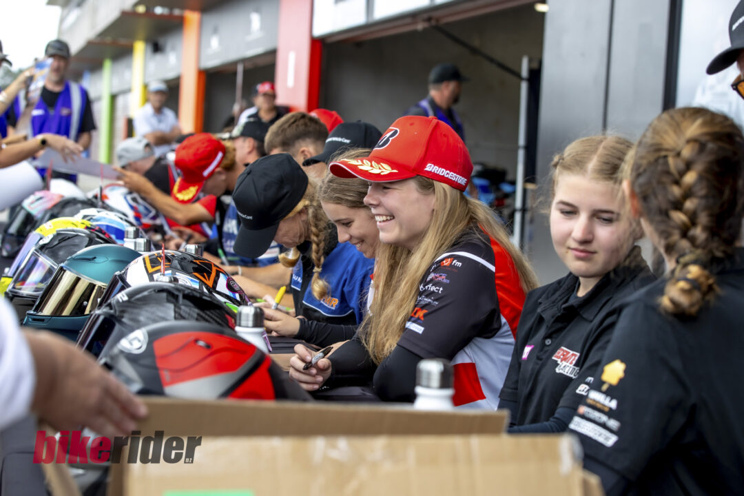 The signing table for racers and legends proved popular