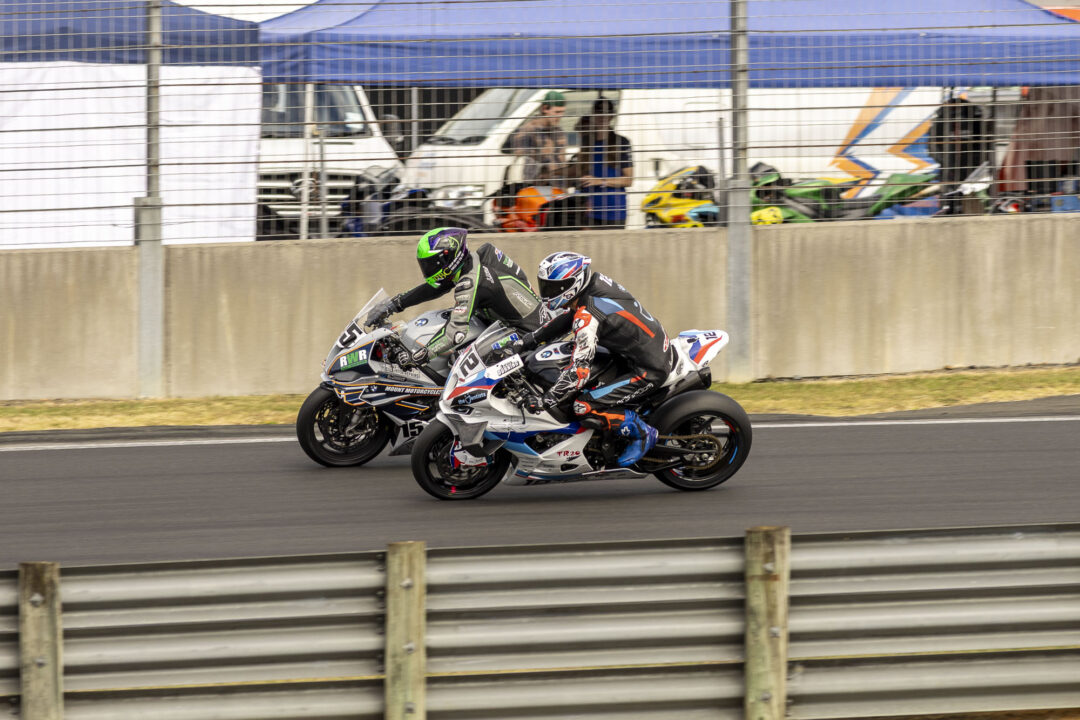 Luca Durning and Rogan Chandler braking together at Hampton Downs at MotoFest