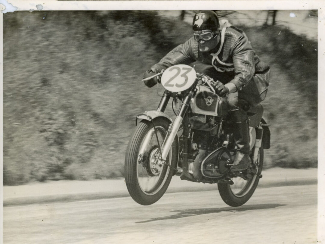 Neville Wooderson Book racing a Matchless at the Isle of Man both wheels off the ground