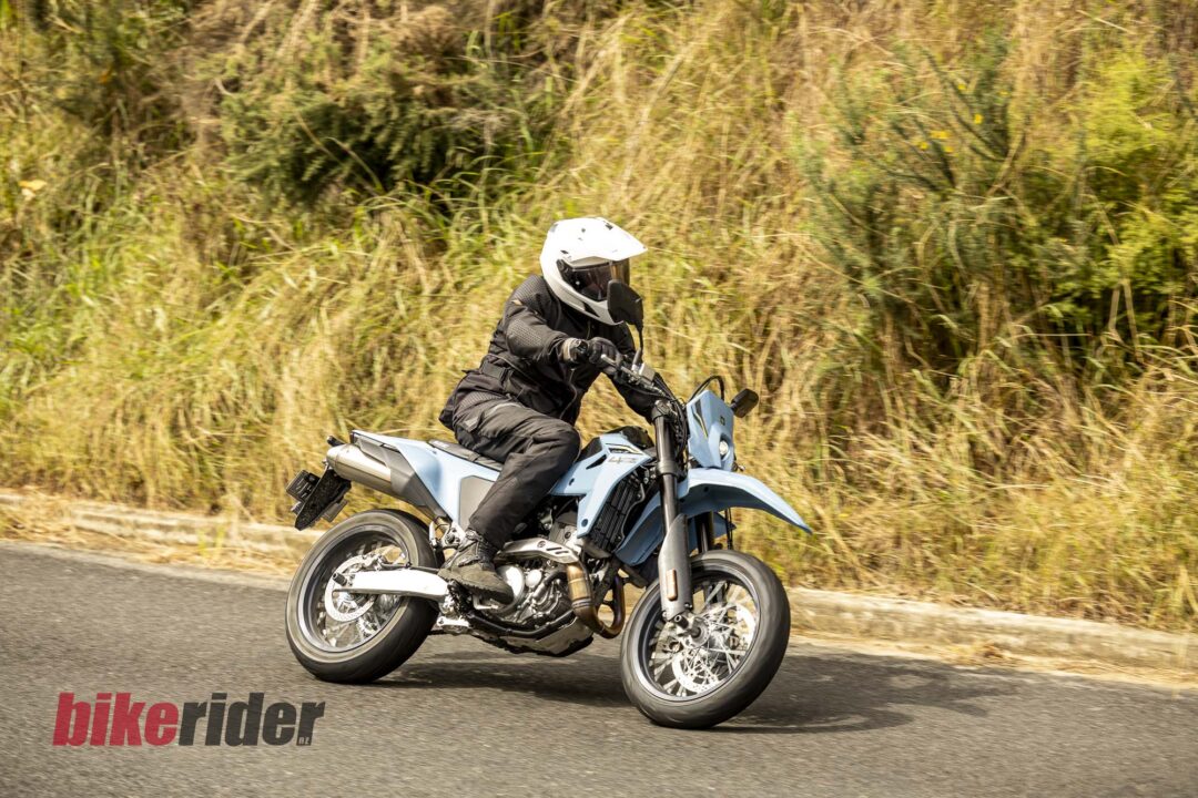 Suzuki DR-Z4SM cornering on a road in New Zealand