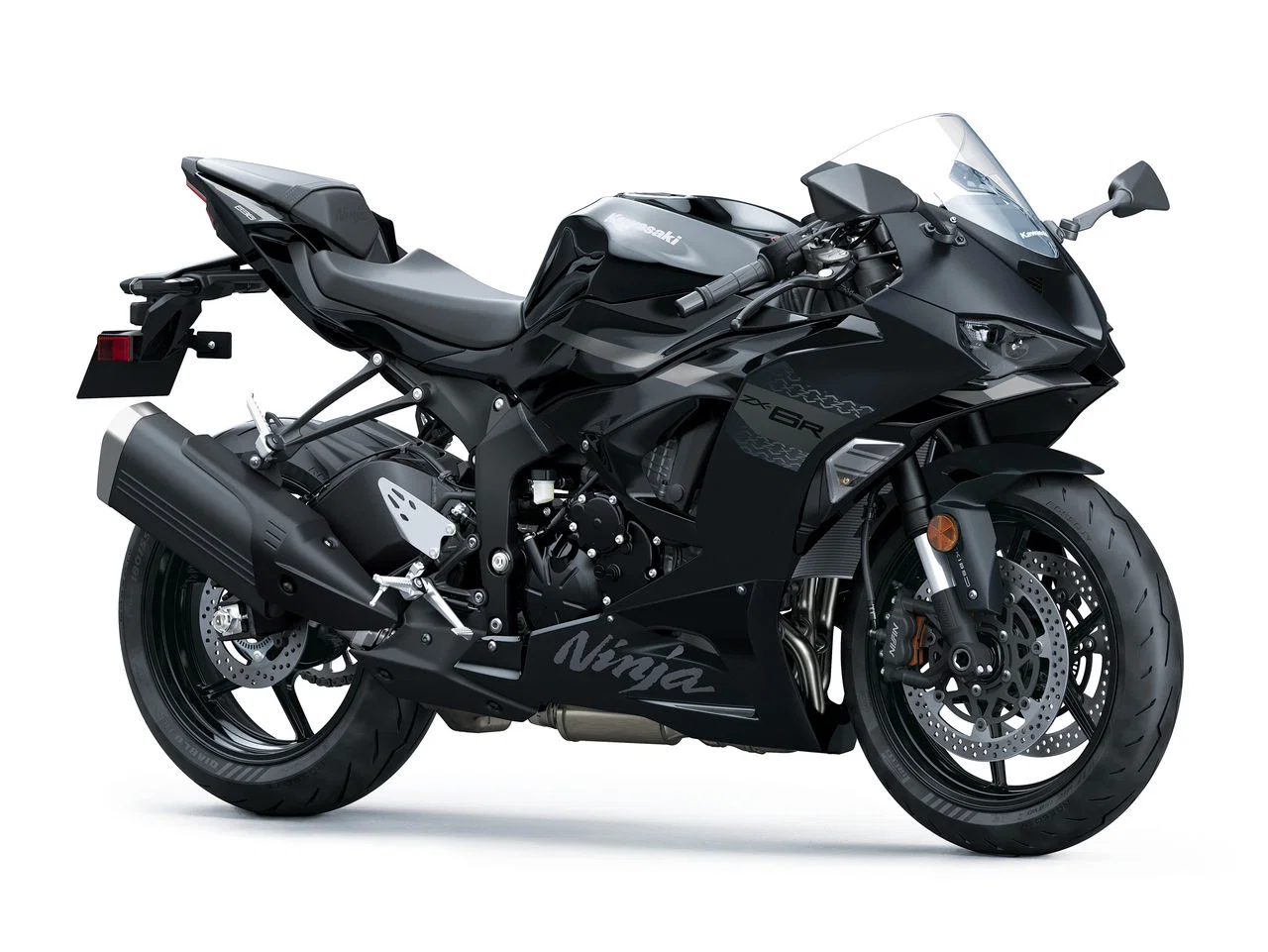 Black Kawasaki Ninja ZX-6R sport motorcycle shown in a left-side profile with aerodynamic fairings and a large exhaust.