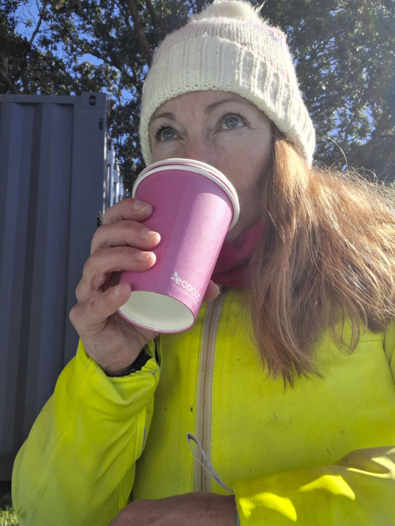 motorcyclist drinking coffee