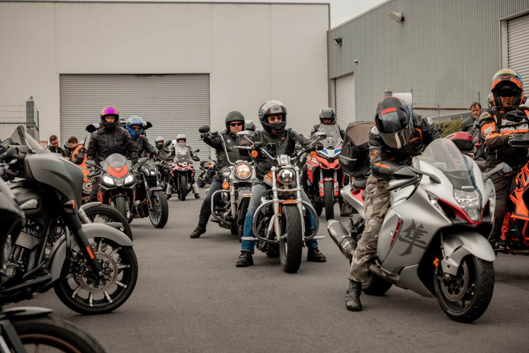 group of motorcyclists about to go out on a group ride