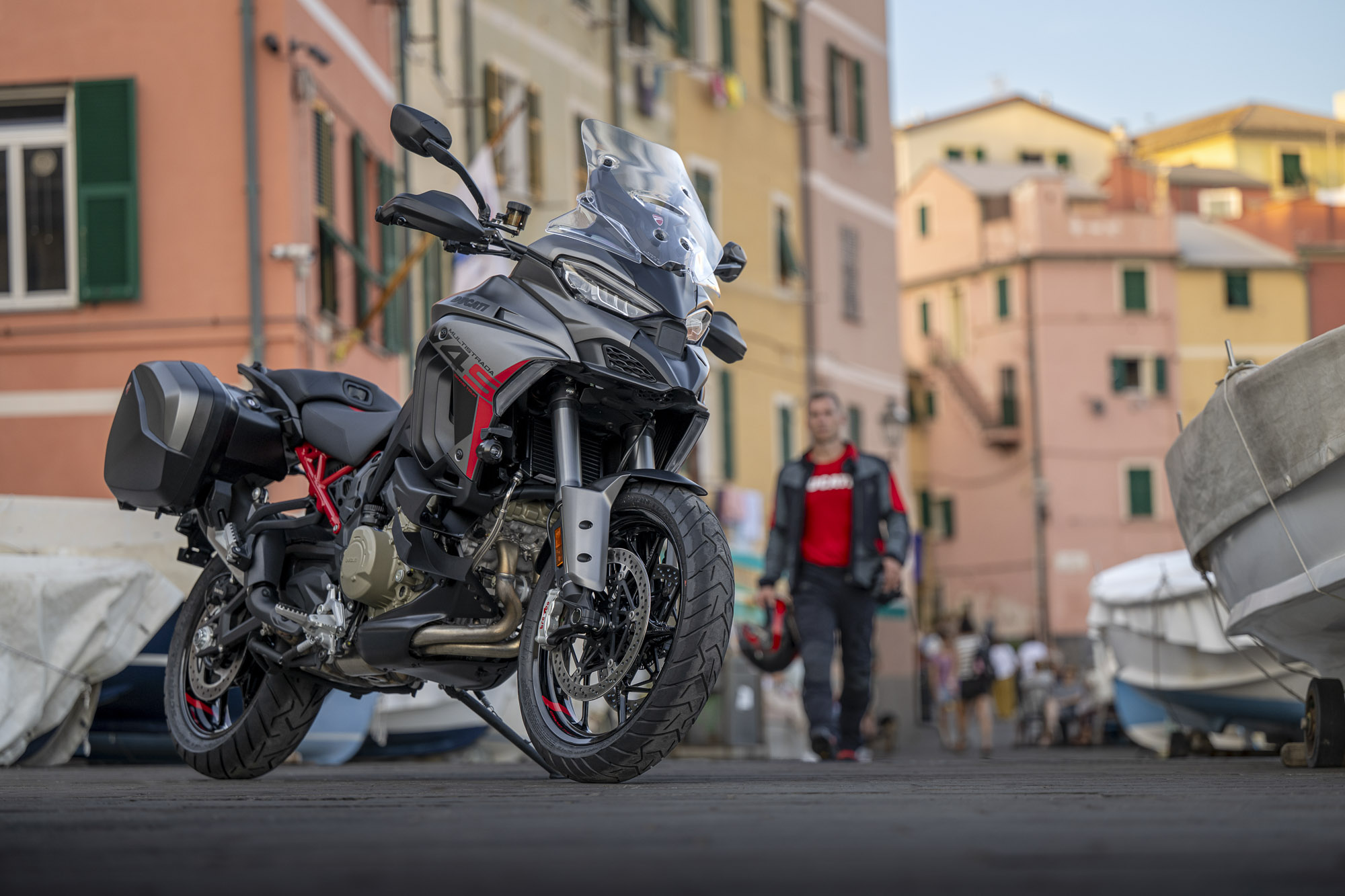 Ducati Multistrada V4 S Grand Tour parked with its colour-matched panniers