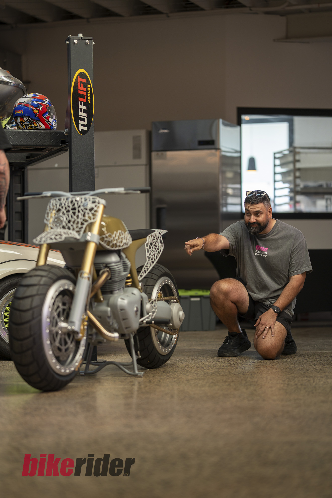 Project MEGA and its builder in the workshop