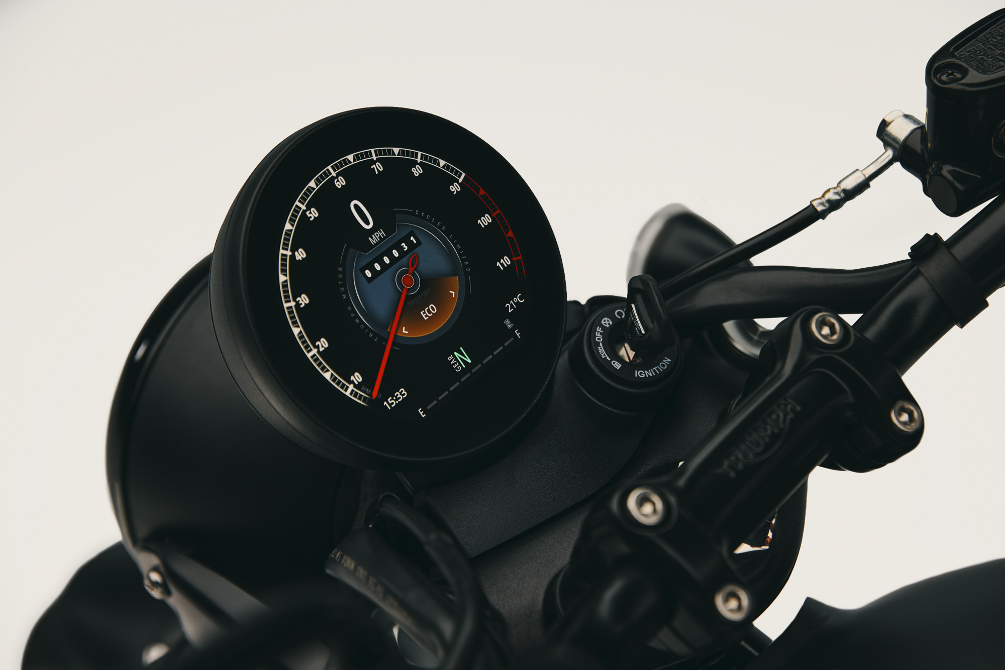 Bonneville T40 circular TFT showing Eco riding mode and fuel information