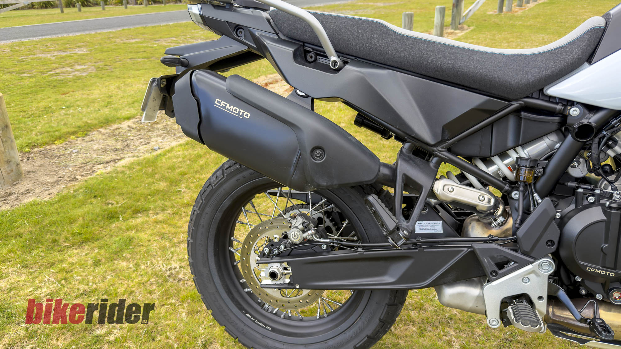 CFMOTO 1000MT-X adventure bike exhaust, spoked rear wheel, swingarm and seat