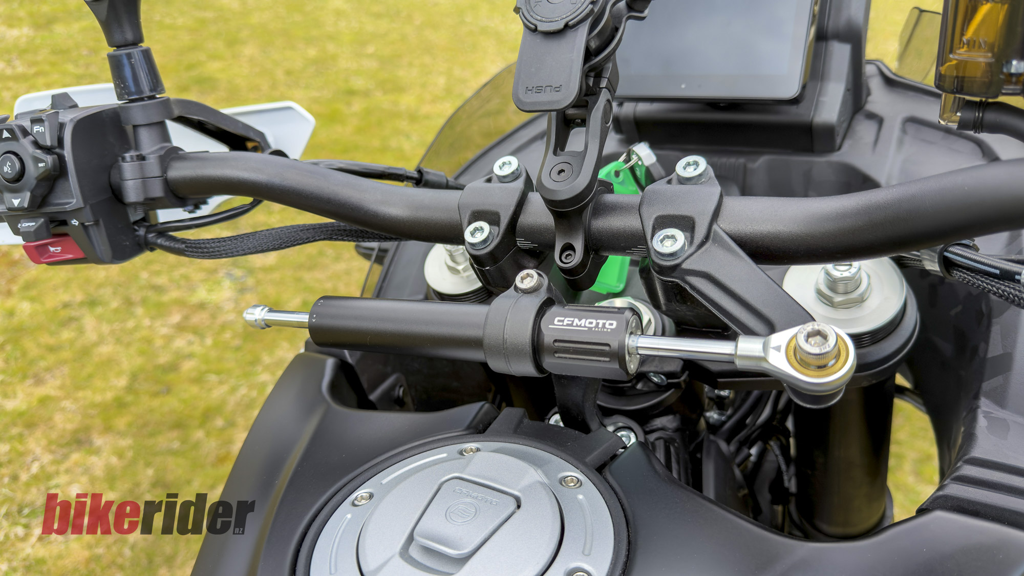 CFMOTO 1000MT-X adventure bike handlebars, steering damper and phone mount
