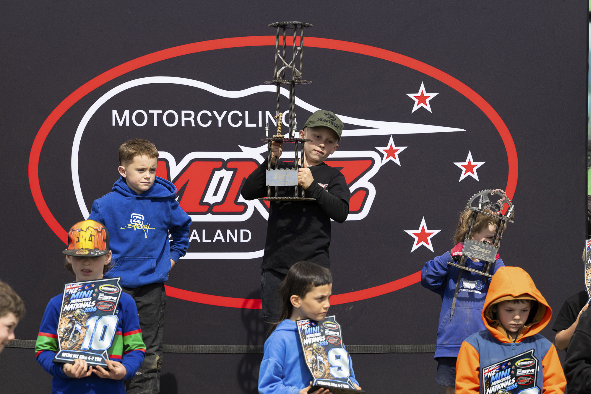 20261004-20261004_MiniMX_3402 The Intro MX50 class podium (from left): Mac Speirs (2nd), Lukas Baker (1st) and Max Welsh at the 2026 NZ Mini Motocross Nationals