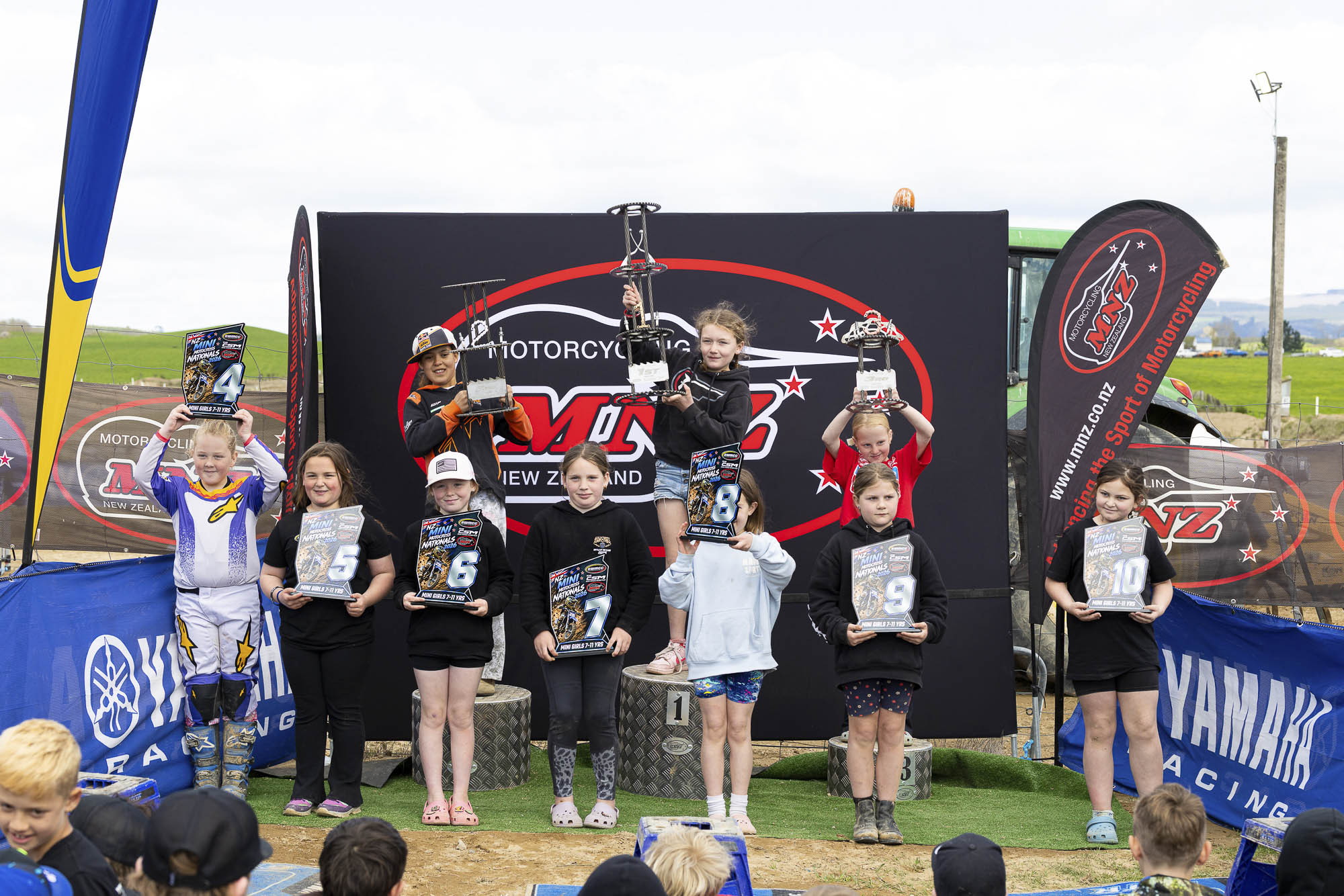 20261004-20261004_MiniMX_3437 The inaugural Mini Girls class podium (from left): Unique Niania (2nd), Mia Manston (1st) and Libby Wind at the 2026 NZ Mini Motocross Nationals