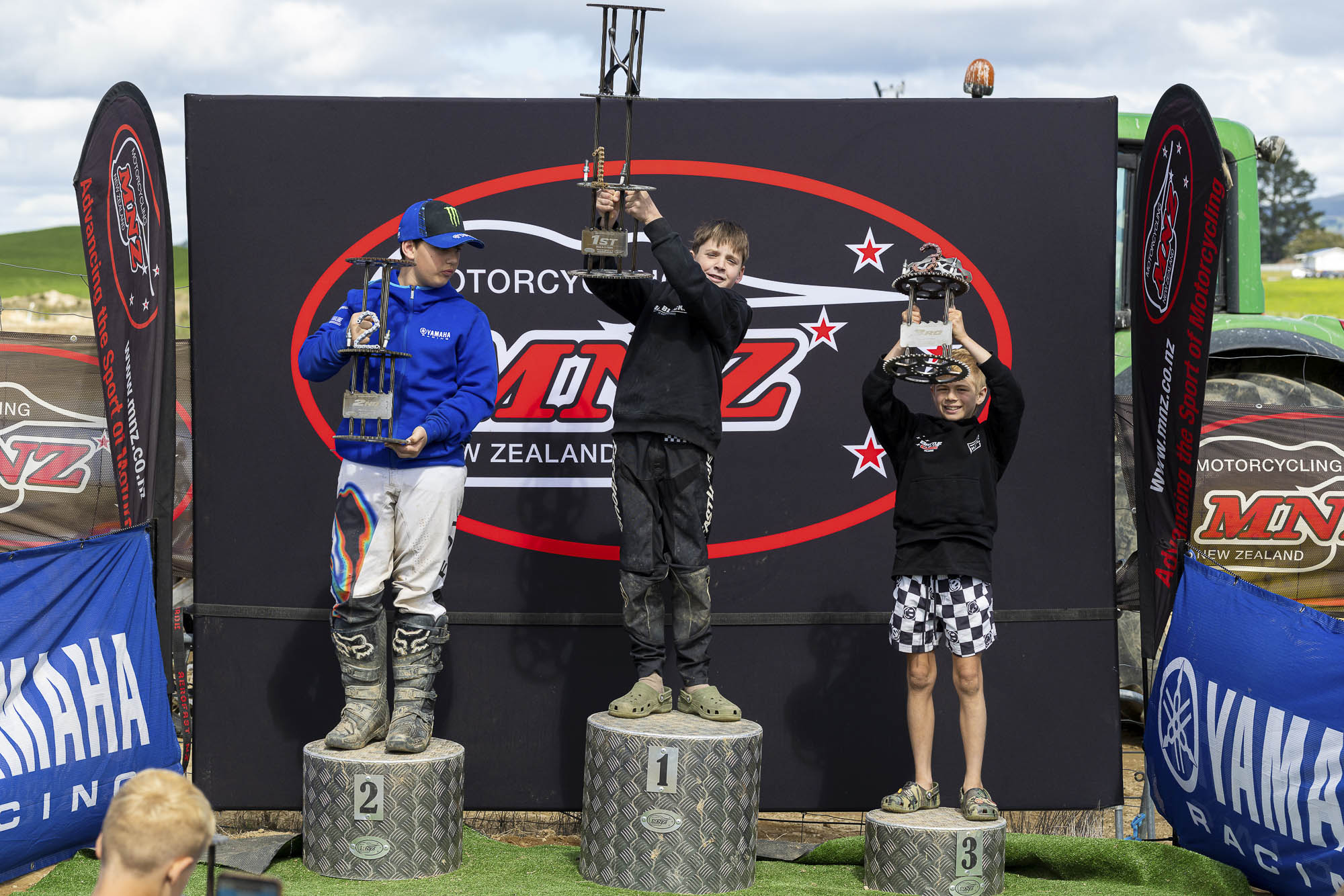 20261004-20261004_MiniMX_3503 The Trail 8-11 Years class podium (from left): Brax Lee (2nd), Jack Bunn (1st) and Kieran Dobbs (3rd) at the 2026 NZ Mini Motocross Nationals