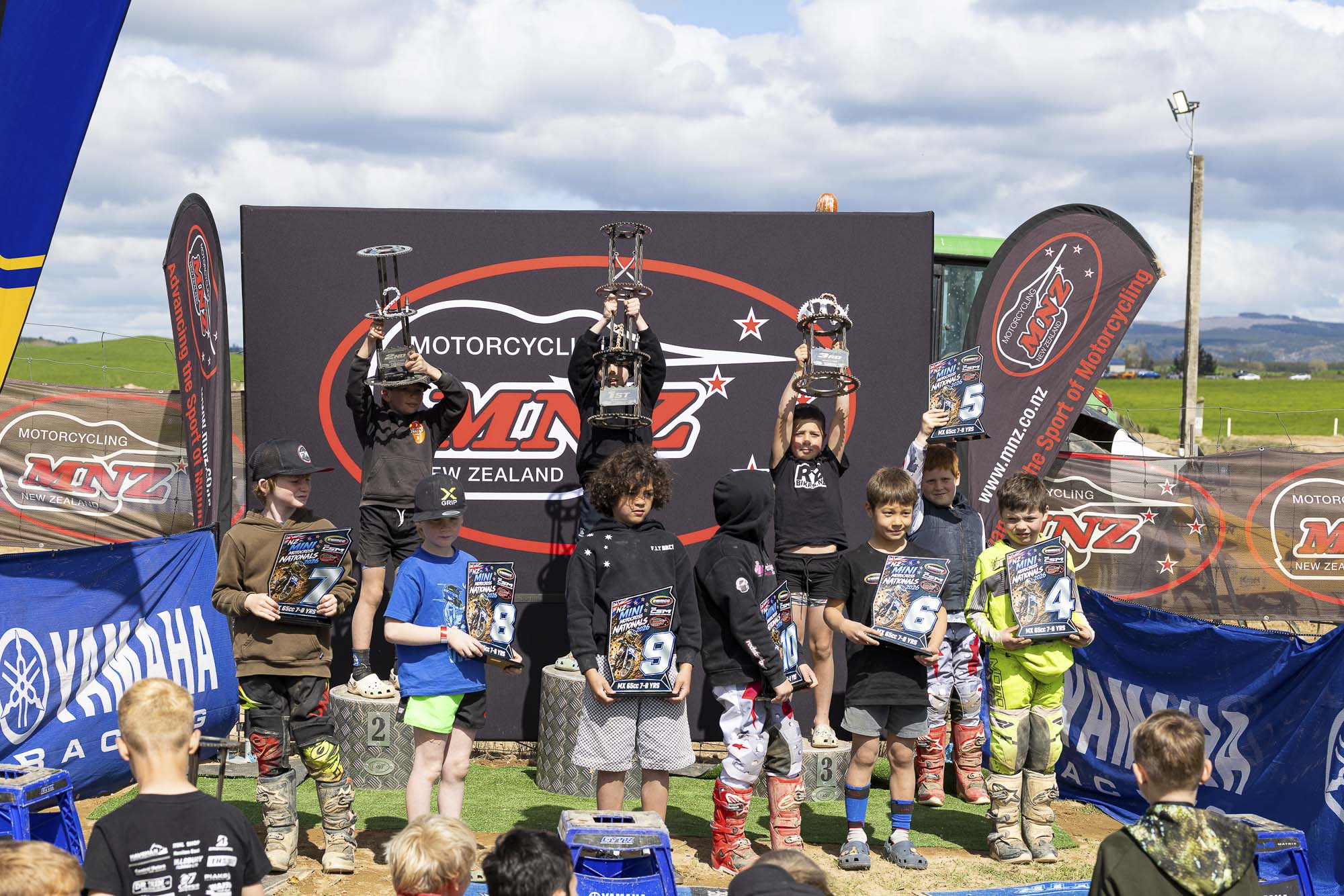 20261004-20261004_MiniMX_3518 The MX65 7-8 Years class podium (from left): Finnian Gillies (2nd), Jackson Slater (1st) and Knox Gibson (3rd) at the 2026 NZ Mini Motocross Nationals