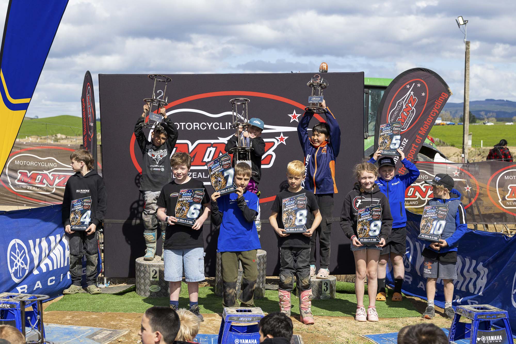 20261004-20261004_MiniMX_3535 The MX65 9-11 Years class podium (from left): Dante McConnell (2nd), Royce Bush (1st) and Anand Rothe (3rd) at the 2026 NZ Mini Motocross Nationals