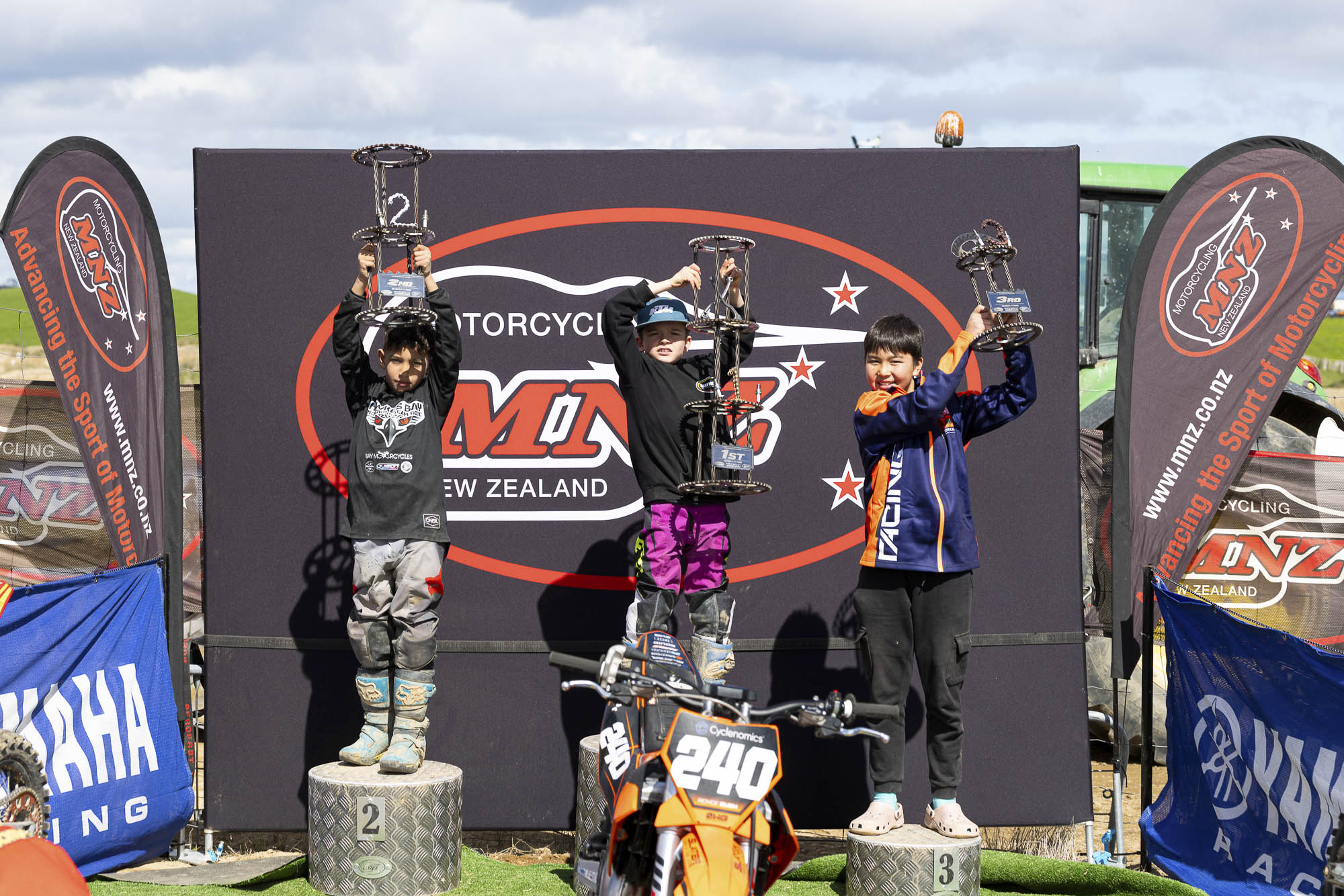 20261004-20261004_MiniMX_3549 The MX65 9-11 Years class podium (from left): Dante McConnell (2nd), Royce Bush (1st) and Anand Rothe (3rd) at the 2026 NZ Mini Motocross Nationals