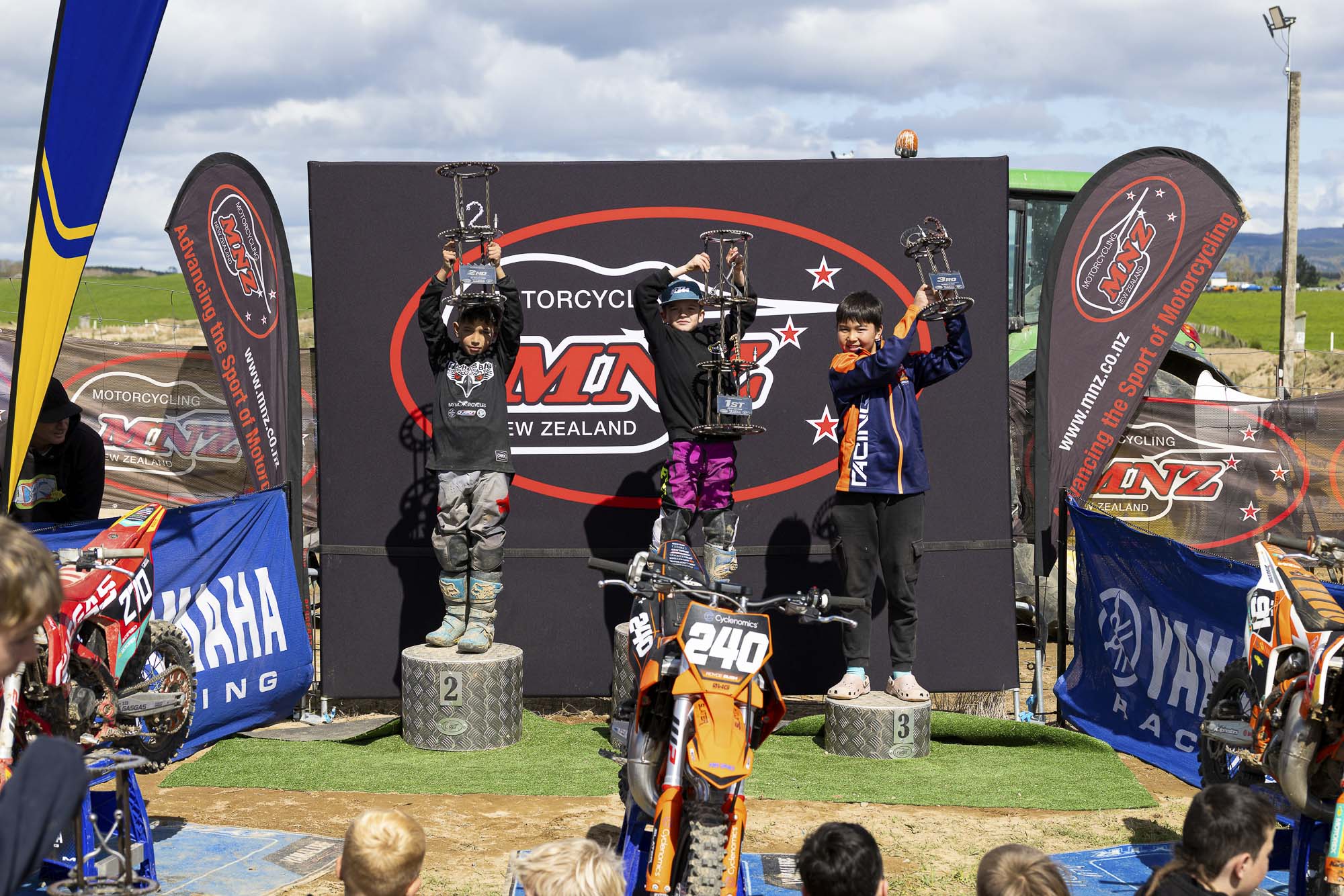 The MX65 9-11 Years class podium (from left): Dante McConnell (2nd), Royce Bush (1st) and Anand Rothe (3rd) at the 2026 NZ Mini Motocross Nationals