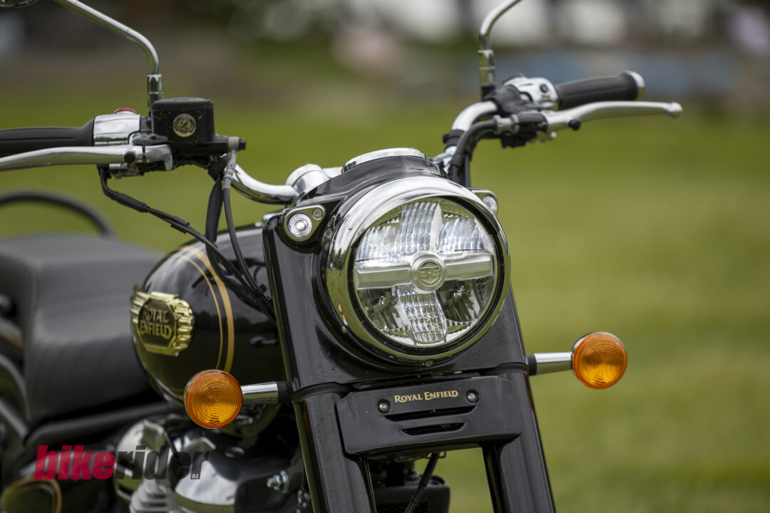 Royal Enfield Bullet 650 in Cannon Black: chrome headlight and front indicators