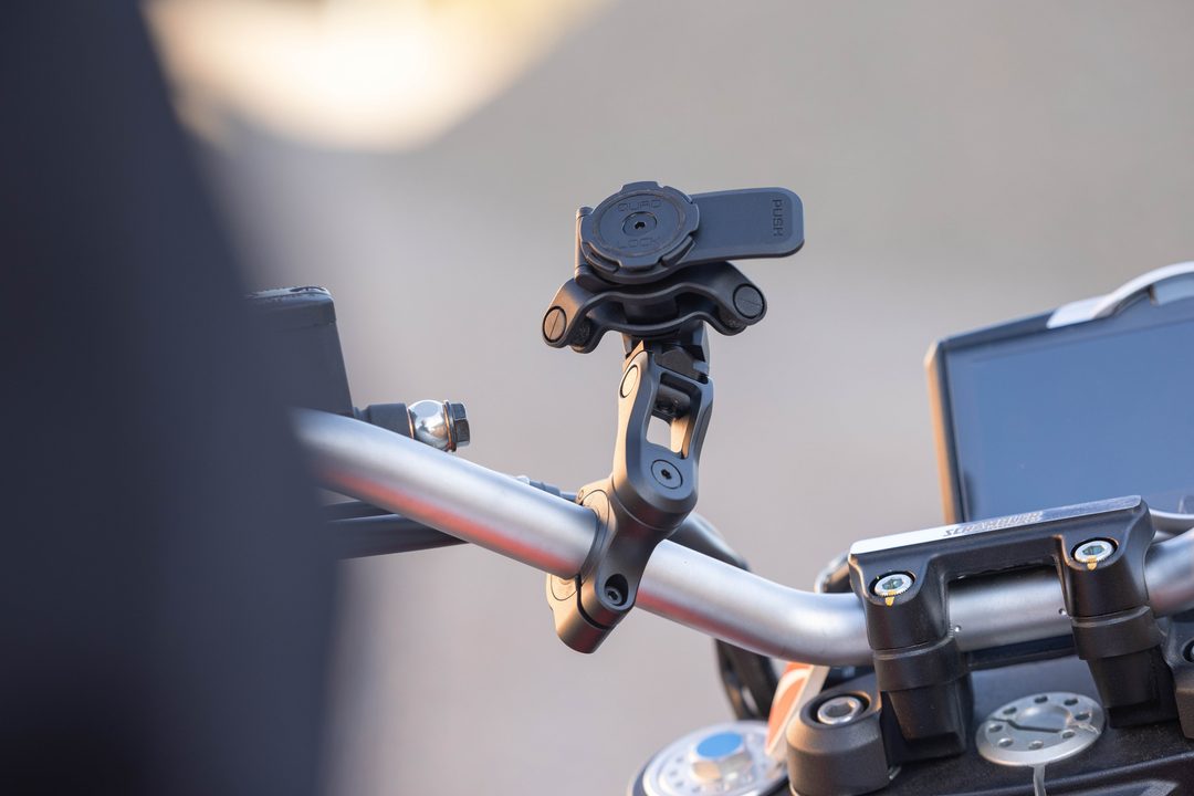 Quad Lock adjustable phone mount on motorcycle handlebars